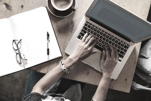 stocksy woman writing laptop abddfcf